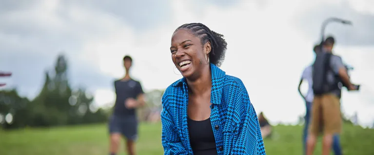Young woman smiling while outdoors
