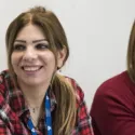 Two women listening to lesson