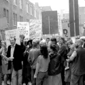 Bangladeshi Squatters in black and white image of people protesting on the street