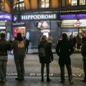 Londoners in Leicester Square at night