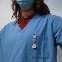 a nurse in a face mask