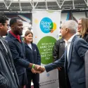 Mayor of London shaking hand with employees at London Living Wage rate announecment 2023, at London Stadium