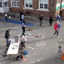 Children and parents playing together at Surrey Square Primary School playground
