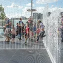 children playing in the fountains at the Southbank Centre