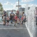 children playing in the fountains at the Southbank Centre