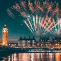 Colourful display of fireworks over London night sky and Big Ben