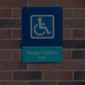 blue badge on wall