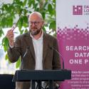 Theo Blackwell MBE speaking on a stage at the Data for London library launch event