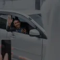 Person hailing private hire cab