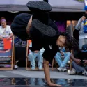 A streetdancer doing a handstand
