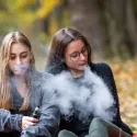 young girls vaping