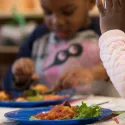 Nursery children having lunch