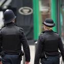 Two policemen patrolling the street