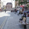 People waking on a highstreet