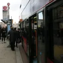 Passengers boarding bus