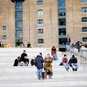 People gathered outside on steps