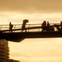 Man with umbrella on Jubilee Bridge
