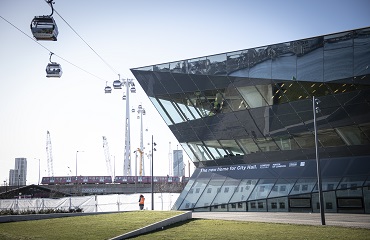 City Hall, home of the Greater London Authority: a modern-looking glass building next to the cable cars at the Royal Docks in Newham.