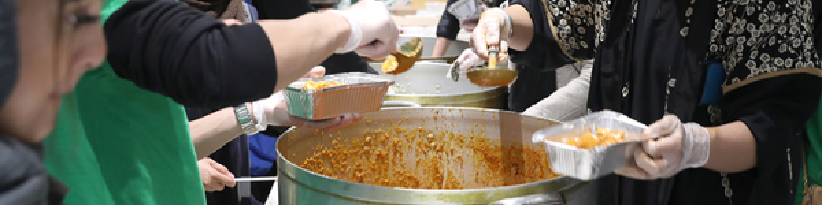 Volunteers serving food