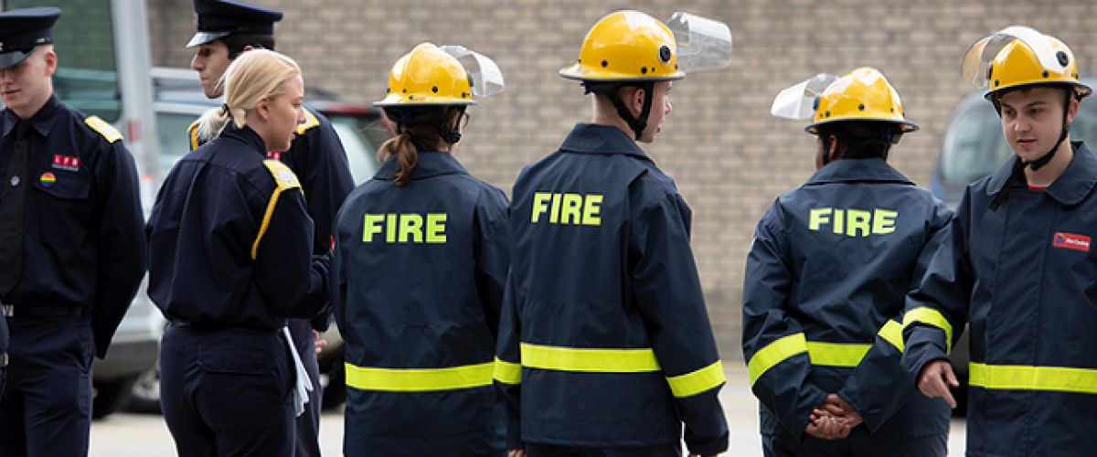 A group of fire fighters in uniform