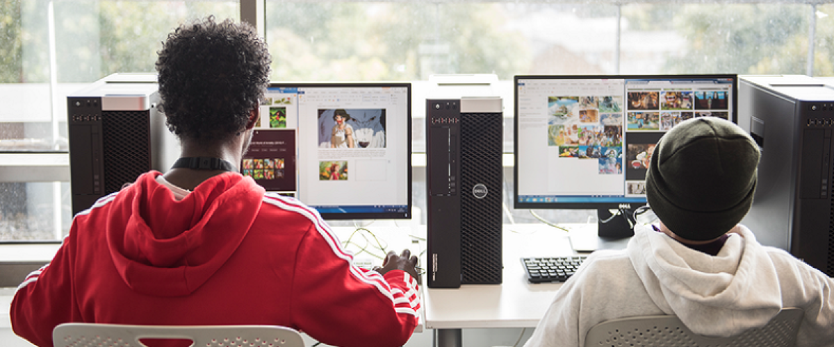 Young men at a computer