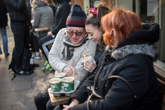 Family having coffees at Broadway Market