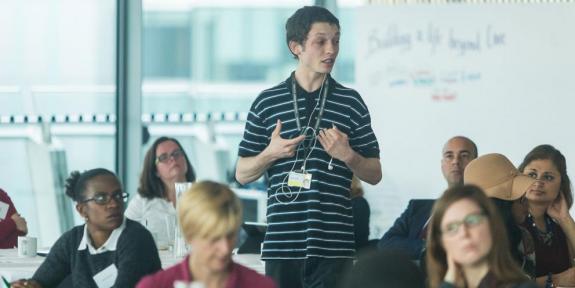 Peer Outreach worker at an event at City Hall