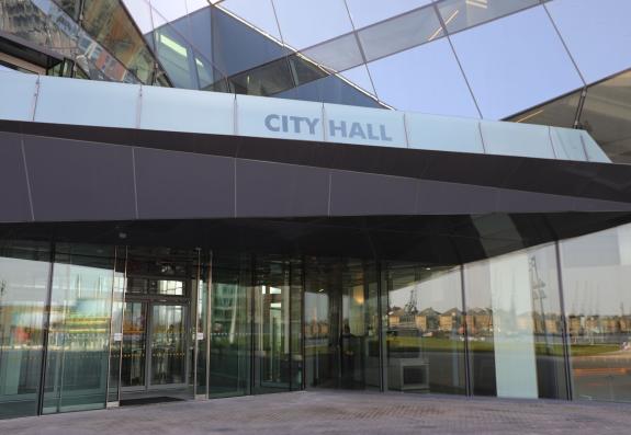 Entrance of City Hall glass building in Newham