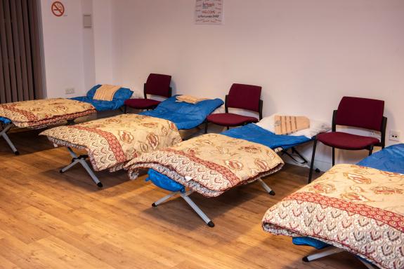 A row of beds at homeless charity St Mungo