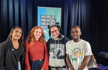 Photograph of four young performers at London's World Mental Health Day Festival 2021