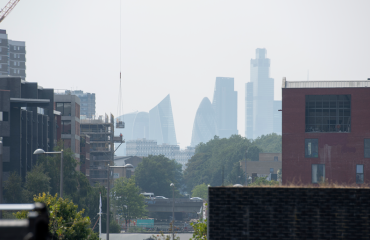 A very hazy view of London's skyline, featuring the Gherkin and the Walkie Talkie