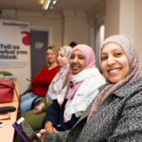 A photo of women at a healthwatch event